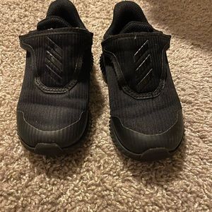 Black 8K adidas shoes.
